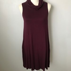 A cowl neck / turtle neck baby doll dress